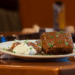 Delicious Teriyaki Meatloaf With Mashed Potato On A White Plate