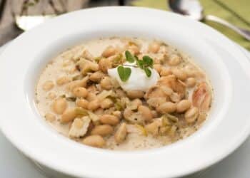 Easy White Chicken Chili Recipe Served In A White Bowl