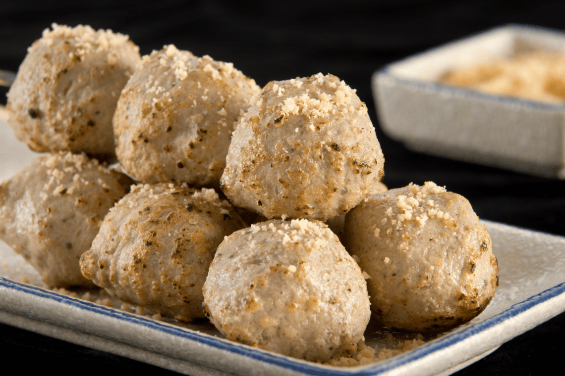 Finger Lickin’ Mozzarella-Stuffed Chicken Pesto Meatballs