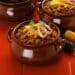 Heartwarming Bbq Bison Chili With Grated Cheddar Cheese On Top