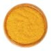 Curry Powder In Wooden Bowl Over White