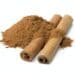 Heap Of Ground Cinnamon And Cassia Cinnamon Sticks