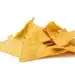 Pile Of Corn Tortilla Chips Or Nachos Isolated On A White Background